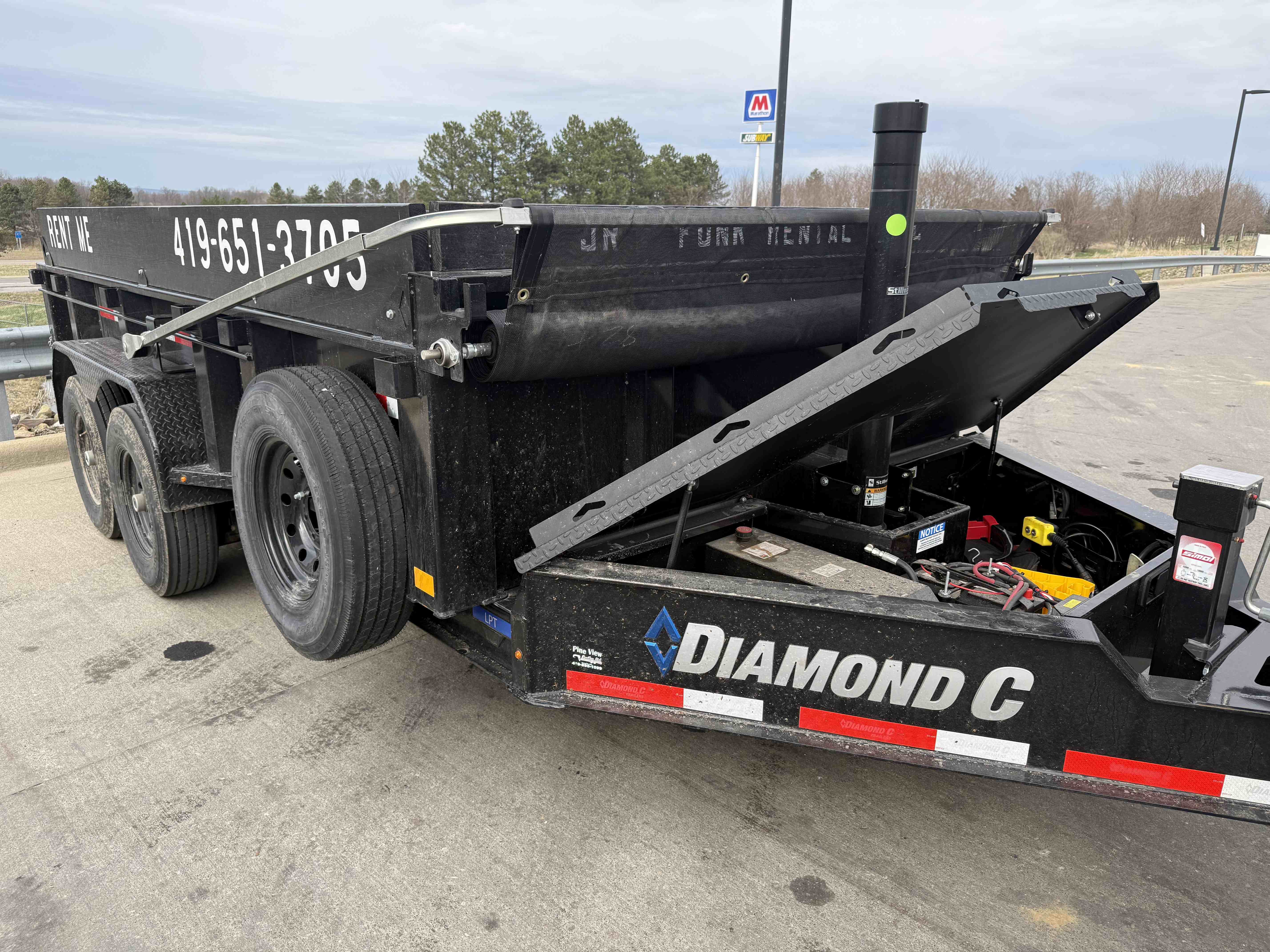 JR Funk Rentals Diamond C dump trailer with open tailgate, available for rent in Ashland County Ohio